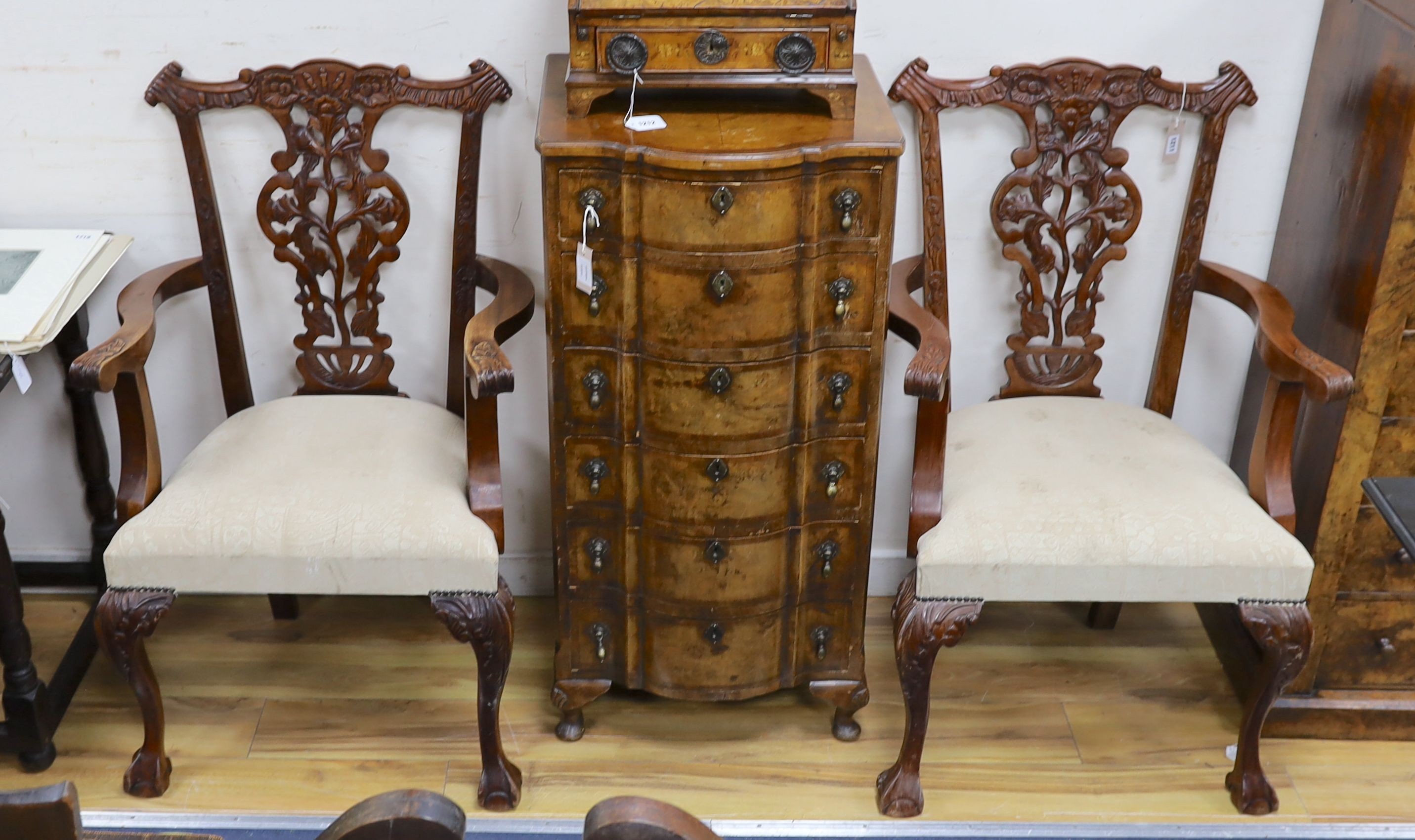 A pair of Chippendale style mahogany elbow chairs, width 67cm, depth 57cm, height 106cm